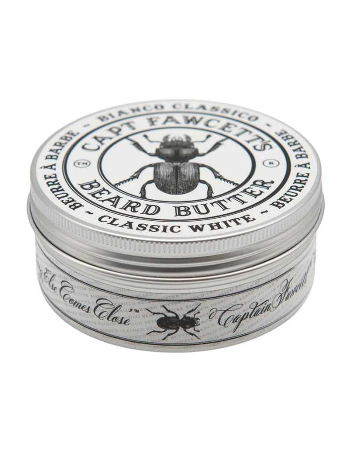 Close-up of Bianco Classico Beard Butter tin with beetle logo, black and white design