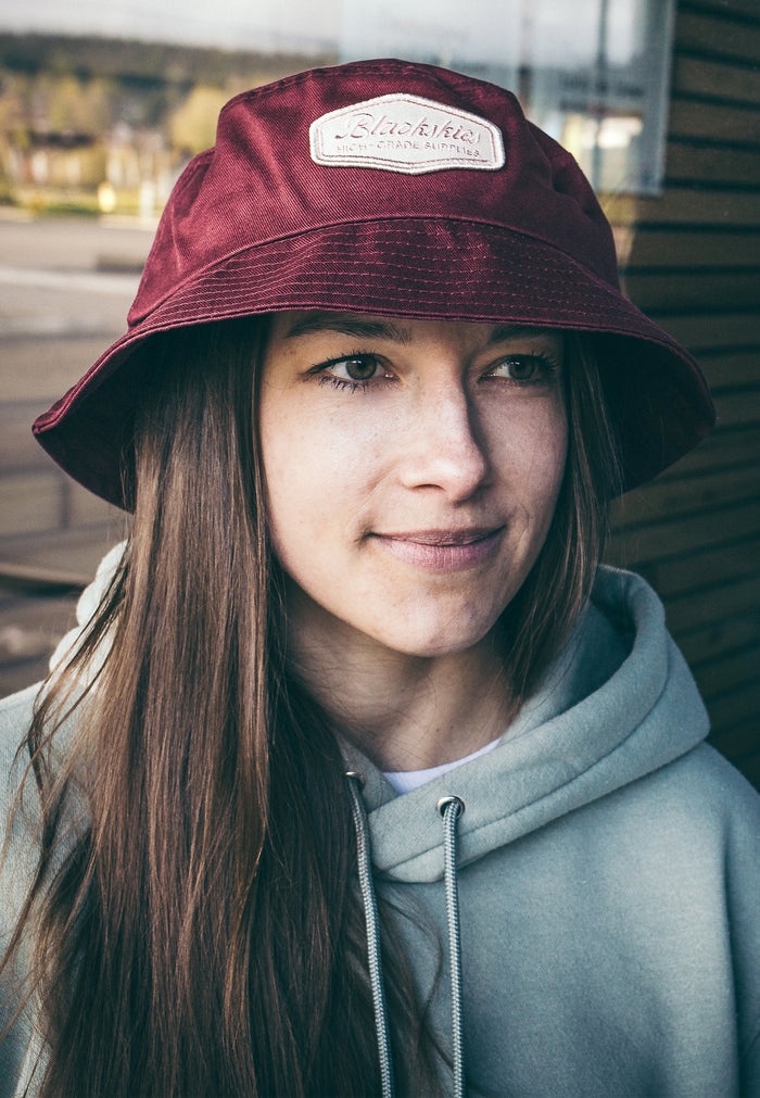 Blackskies-Oasis-Bucket-Hat-Maroon-Beige-Fisher-Hat-Bob-Lovely-Model