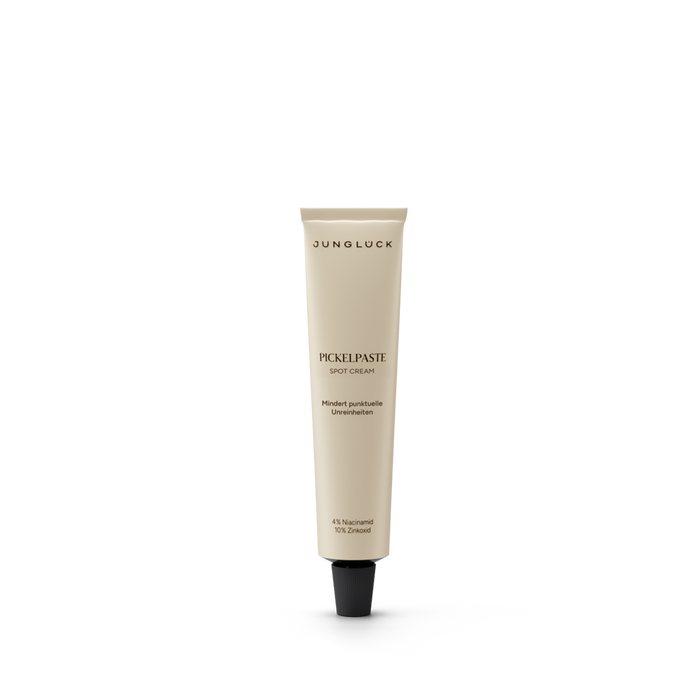 Beige tube of Pickelpaste facial care cream with black cap and minimal text design.