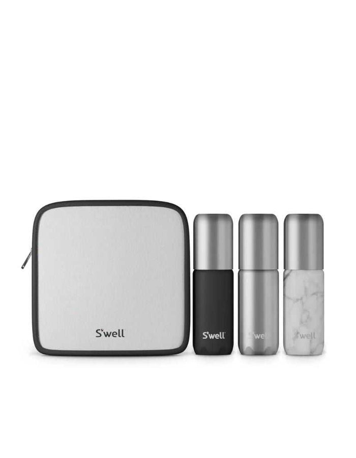 Travel bottle set with black, silver, and marble white aluminum bottles, and a white toiletry bag with black trim for travel convenience