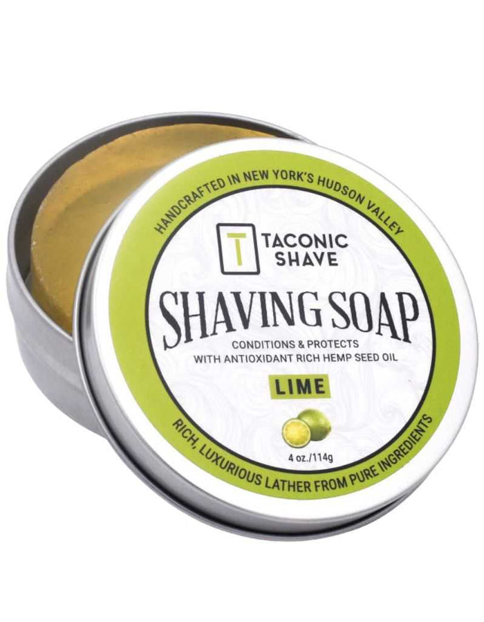 Open tin of Taconic Lime Shaving Soap showing the yellow-green soap inside